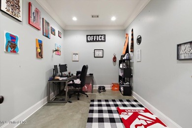 Tucked away in a quiet cul-de-sac within the highly desired on Colonial Country Club Deerfield in Mississippi - for sale on GolfHomes.com, golf home, golf lot