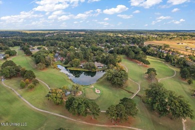 Tucked away in a quiet cul-de-sac within the highly desired on Colonial Country Club Deerfield in Mississippi - for sale on GolfHomes.com, golf home, golf lot