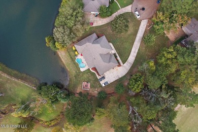 Tucked away in a quiet cul-de-sac within the highly desired on Colonial Country Club Deerfield in Mississippi - for sale on GolfHomes.com, golf home, golf lot