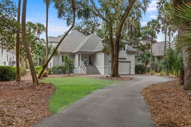 Located on a quiet cul-de-sac overlooking the 17th fairway of on The Seabrook Island Club in South Carolina - for sale on GolfHomes.com, golf home, golf lot