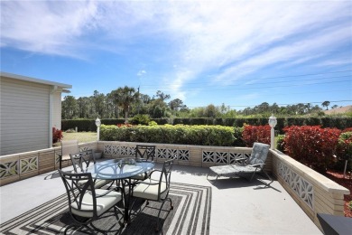 Under contract-accepting backup offers. The curb appeal of this on Maple Leaf Golf and Country Club in Florida - for sale on GolfHomes.com, golf home, golf lot