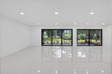 Stunning, 3 Bedroom, 2.5 Bath 1st floor corner Willow Wood on Boca West Golf and Country Club in Florida - for sale on GolfHomes.com, golf home, golf lot