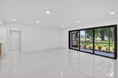 Stunning, 3 Bedroom, 2.5 Bath 1st floor corner Willow Wood on Boca West Golf and Country Club in Florida - for sale on GolfHomes.com, golf home, golf lot