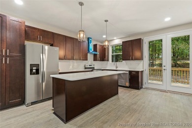 This lovely new construction home is located in the friendly on Carolina Trace Country Club in North Carolina - for sale on GolfHomes.com, golf home, golf lot