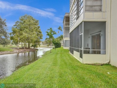 JUST SIT ON YOU SCREENED BALCONY AND ENJOY THIS BEAUTIFUL VIEW on Lauderhill Golf Course in Florida - for sale on GolfHomes.com, golf home, golf lot