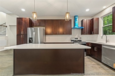 This lovely new construction home is located in the friendly on Carolina Trace Country Club in North Carolina - for sale on GolfHomes.com, golf home, golf lot