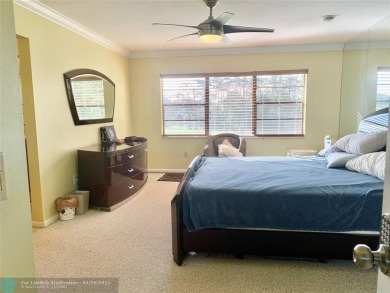 Amazing two bedroom, two and a half bath, guard gated townhouse on Boca Lago Golf and Country Club in Florida - for sale on GolfHomes.com, golf home, golf lot