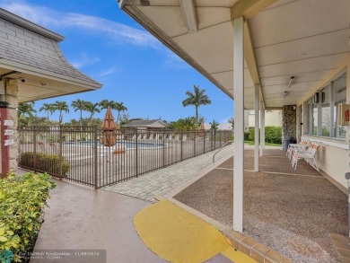 JUST SIT ON YOU SCREENED BALCONY AND ENJOY THIS BEAUTIFUL VIEW on Lauderhill Golf Course in Florida - for sale on GolfHomes.com, golf home, golf lot