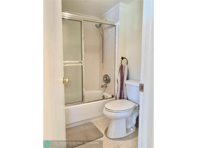 Amazing two bedroom, two and a half bath, guard gated townhouse on Boca Lago Golf and Country Club in Florida - for sale on GolfHomes.com, golf home, golf lot