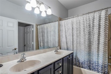 Spacious 4 Bedroom 2 1/2 baths located in Valencia Golf Country on Valencia Golf and Country Club in Florida - for sale on GolfHomes.com, golf home, golf lot