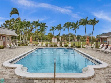 JUST SIT ON YOU SCREENED BALCONY AND ENJOY THIS BEAUTIFUL VIEW on Lauderhill Golf Course in Florida - for sale on GolfHomes.com, golf home, golf lot