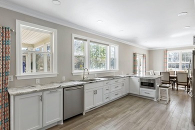 Tucked along the fairways of Charleston National, 1309 National on Charleston National Golf Club in South Carolina - for sale on GolfHomes.com, golf home, golf lot