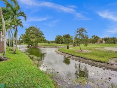 JUST SIT ON YOU SCREENED BALCONY AND ENJOY THIS BEAUTIFUL VIEW on Lauderhill Golf Course in Florida - for sale on GolfHomes.com, golf home, golf lot