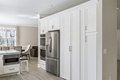 Tucked along the fairways of Charleston National, 1309 National on Charleston National Golf Club in South Carolina - for sale on GolfHomes.com, golf home, golf lot