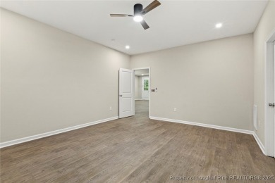 This lovely new construction home is located in the friendly on Carolina Trace Country Club in North Carolina - for sale on GolfHomes.com, golf home, golf lot