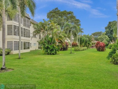 JUST SIT ON YOU SCREENED BALCONY AND ENJOY THIS BEAUTIFUL VIEW on Lauderhill Golf Course in Florida - for sale on GolfHomes.com, golf home, golf lot