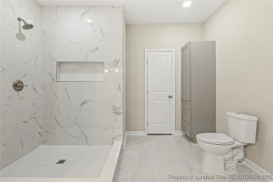 This lovely new construction home is located in the friendly on Carolina Trace Country Club in North Carolina - for sale on GolfHomes.com, golf home, golf lot