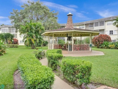 JUST SIT ON YOU SCREENED BALCONY AND ENJOY THIS BEAUTIFUL VIEW on Lauderhill Golf Course in Florida - for sale on GolfHomes.com, golf home, golf lot