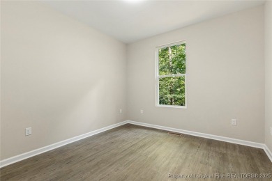 This lovely new construction home is located in the friendly on Carolina Trace Country Club in North Carolina - for sale on GolfHomes.com, golf home, golf lot
