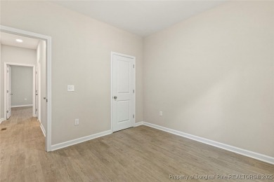 This lovely new construction home is located in the friendly on Carolina Trace Country Club in North Carolina - for sale on GolfHomes.com, golf home, golf lot