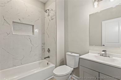 This lovely new construction home is located in the friendly on Carolina Trace Country Club in North Carolina - for sale on GolfHomes.com, golf home, golf lot