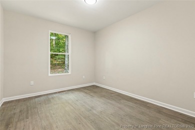 This lovely new construction home is located in the friendly on Carolina Trace Country Club in North Carolina - for sale on GolfHomes.com, golf home, golf lot