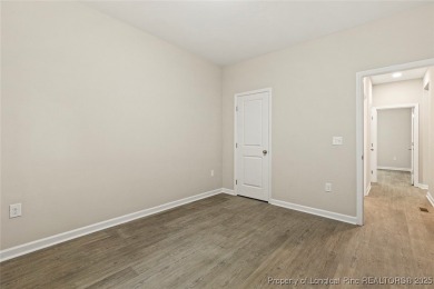 This lovely new construction home is located in the friendly on Carolina Trace Country Club in North Carolina - for sale on GolfHomes.com, golf home, golf lot