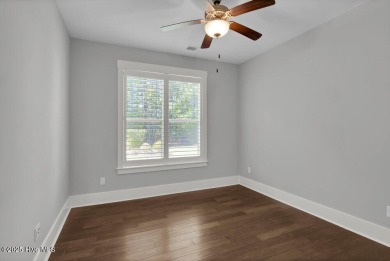 This thoughtfully crafted home in the sought-after community of on Cape Fear National At Brunswick Forest in North Carolina - for sale on GolfHomes.com, golf home, golf lot