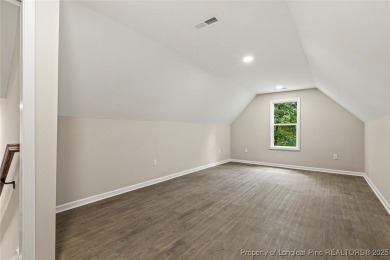 This lovely new construction home is located in the friendly on Carolina Trace Country Club in North Carolina - for sale on GolfHomes.com, golf home, golf lot
