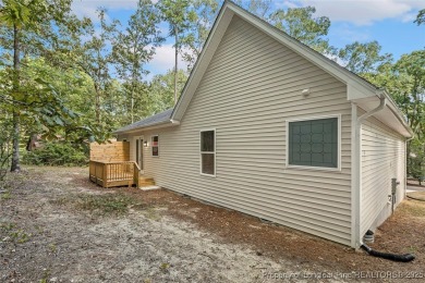 This lovely new construction home is located in the friendly on Carolina Trace Country Club in North Carolina - for sale on GolfHomes.com, golf home, golf lot
