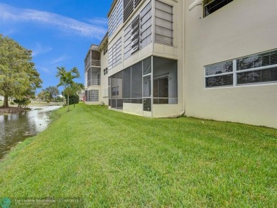 JUST SIT ON YOU SCREENED BALCONY AND ENJOY THIS BEAUTIFUL VIEW on Lauderhill Golf Course in Florida - for sale on GolfHomes.com, golf home, golf lot