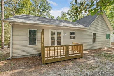 This lovely new construction home is located in the friendly on Carolina Trace Country Club in North Carolina - for sale on GolfHomes.com, golf home, golf lot