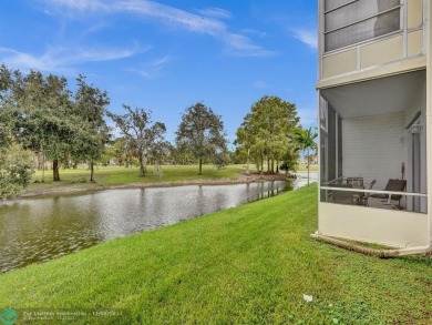 JUST SIT ON YOU SCREENED BALCONY AND ENJOY THIS BEAUTIFUL VIEW on Lauderhill Golf Course in Florida - for sale on GolfHomes.com, golf home, golf lot