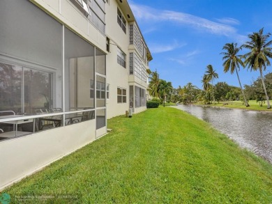 JUST SIT ON YOU SCREENED BALCONY AND ENJOY THIS BEAUTIFUL VIEW on Lauderhill Golf Course in Florida - for sale on GolfHomes.com, golf home, golf lot