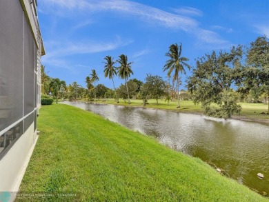 JUST SIT ON YOU SCREENED BALCONY AND ENJOY THIS BEAUTIFUL VIEW on Lauderhill Golf Course in Florida - for sale on GolfHomes.com, golf home, golf lot