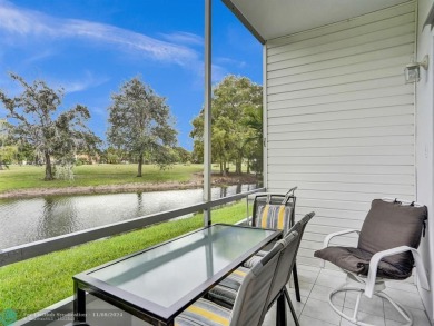 JUST SIT ON YOU SCREENED BALCONY AND ENJOY THIS BEAUTIFUL VIEW on Lauderhill Golf Course in Florida - for sale on GolfHomes.com, golf home, golf lot