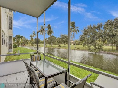 JUST SIT ON YOU SCREENED BALCONY AND ENJOY THIS BEAUTIFUL VIEW on Lauderhill Golf Course in Florida - for sale on GolfHomes.com, golf home, golf lot