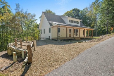 Discover luxury mountain living in this new construction on Trillium Links in North Carolina - for sale on GolfHomes.com, golf home, golf lot