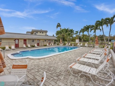 JUST SIT ON YOU SCREENED BALCONY AND ENJOY THIS BEAUTIFUL VIEW on Lauderhill Golf Course in Florida - for sale on GolfHomes.com, golf home, golf lot