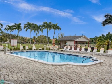 JUST SIT ON YOU SCREENED BALCONY AND ENJOY THIS BEAUTIFUL VIEW on Lauderhill Golf Course in Florida - for sale on GolfHomes.com, golf home, golf lot