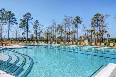 This thoughtfully crafted home in the sought-after community of on Cape Fear National At Brunswick Forest in North Carolina - for sale on GolfHomes.com, golf home, golf lot
