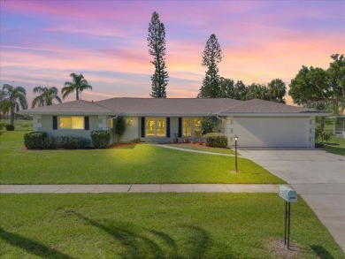 Tucked along a quiet stretch of Sandpiper Bay, this home blends on Club Med Sandpiper in Florida - for sale on GolfHomes.com, golf home, golf lot