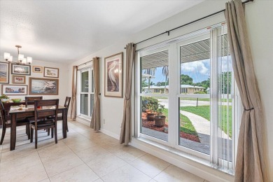 Tucked along a quiet stretch of Sandpiper Bay, this home blends on Club Med Sandpiper in Florida - for sale on GolfHomes.com, golf home, golf lot