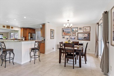 Tucked along a quiet stretch of Sandpiper Bay, this home blends on Club Med Sandpiper in Florida - for sale on GolfHomes.com, golf home, golf lot