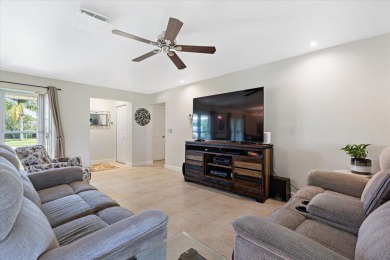 Tucked along a quiet stretch of Sandpiper Bay, this home blends on Club Med Sandpiper in Florida - for sale on GolfHomes.com, golf home, golf lot