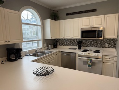 Welcome home to this golf course view condo located in the on Myrtlewood Golf Course and Club  in South Carolina - for sale on GolfHomes.com, golf home, golf lot