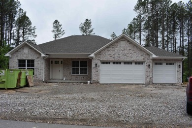Beautiful new construction with lots of street appeal.  2400 sq on Granada Golf Course in Arkansas - for sale on GolfHomes.com, golf home, golf lot