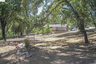 Tucked away on a peaceful cul-de-sac in the beautiful gated on Pine Mountain Lake Country Club in California - for sale on GolfHomes.com, golf home, golf lot