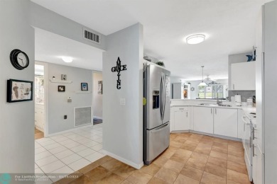 Welcome to your dream retirement home in the heart of Sunrise on Sunrise Lakes Phase IV Golf Course in Florida - for sale on GolfHomes.com, golf home, golf lot