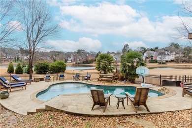 Lakefront living in sought after Hamilton Mill, priced to sell! on Hamilton Mill Golf Club in Georgia - for sale on GolfHomes.com, golf home, golf lot